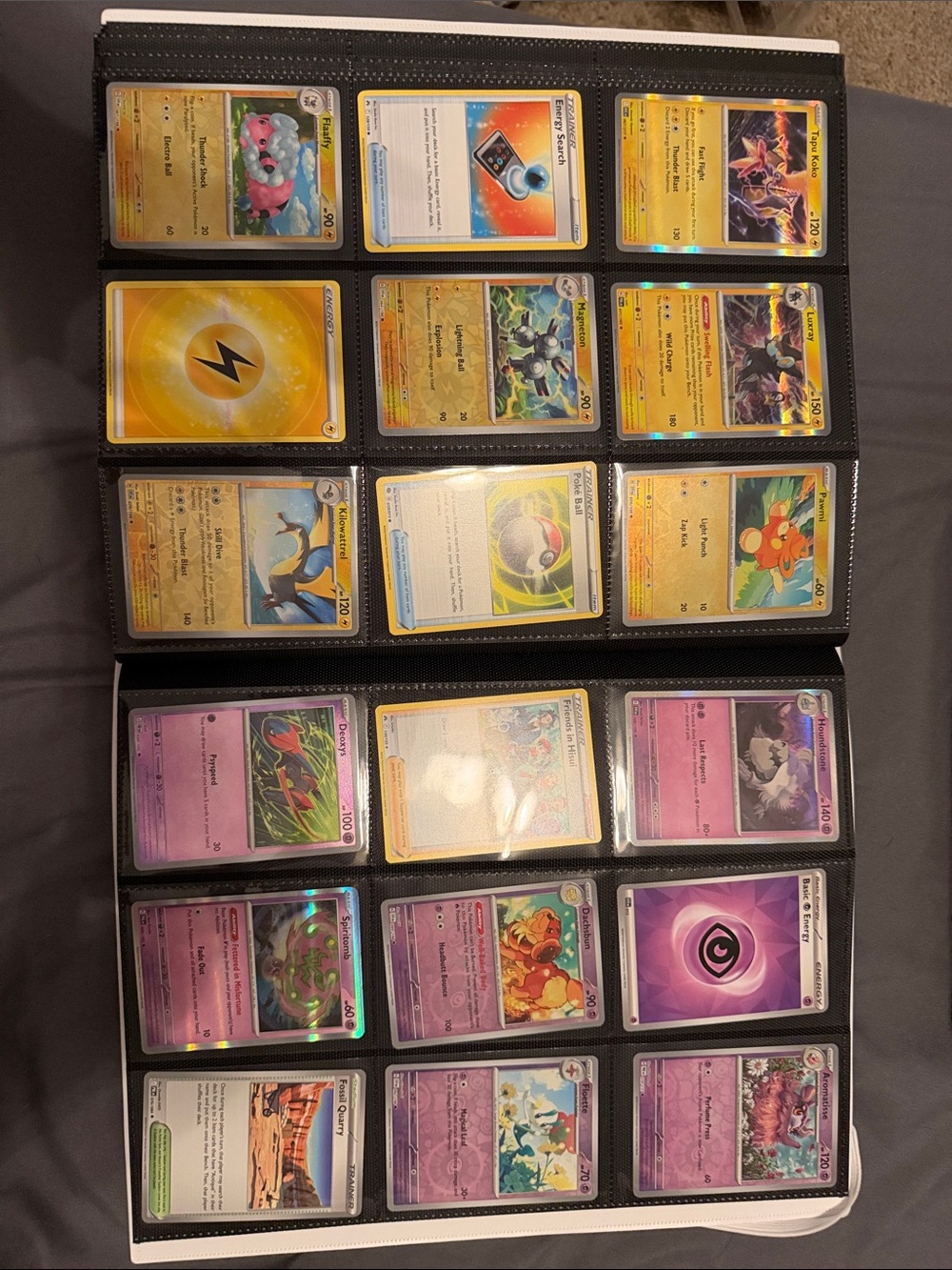 Pokemon Card Binder with Blue, Yellow, Pink and Black Accents
